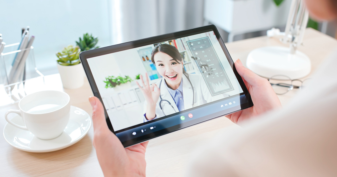 Patient Consulting with Doctor Through Video Call

